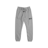 Buzo Fear of God Essentials 1977 Jogger SS22 - Gris Oscuro
