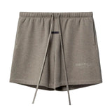 hort Fear of God Essentials Logo Metálico SS25 - Gris oscuro