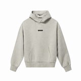 Polerón Fear of God Essentials Classic Fleece Logo Metálico SS25 - Gris Piedra
