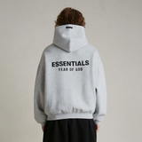 Polerón Fear of God Essentials Fleece FW24 - Gris Claro